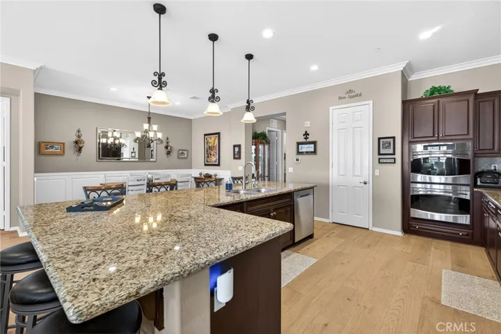 Next to the Double Oven is the Door to the Walk-in Pantry