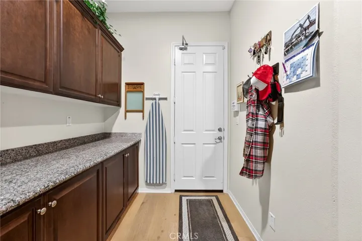 Laundry Room Wraps around and leads to the Garage Door