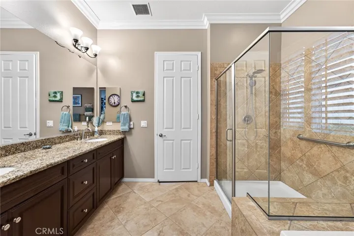 Spacious Primary Bathroom has Walk-In Shower