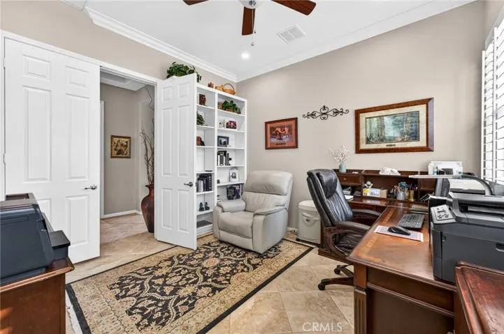 Double-Door Entrance and Built-in Shelving in Den/Office