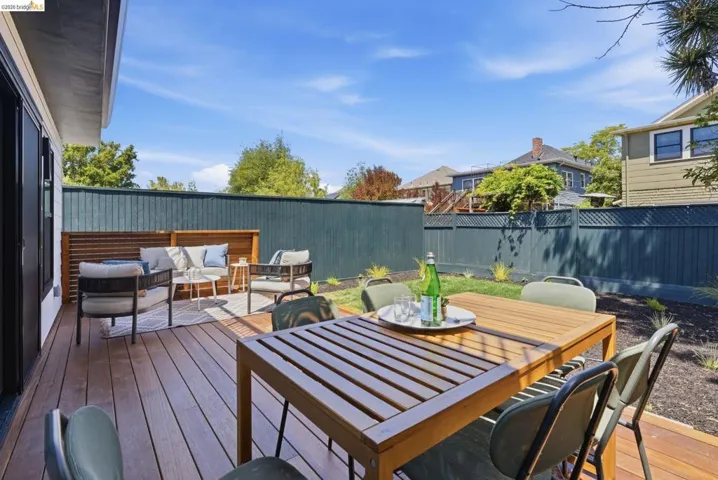Expansive outdoor deck with rich wood-finish flooring