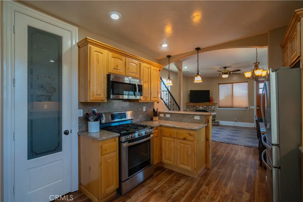 Spacious kitchen featuring a walk-in pantry with extensive storage capacity.