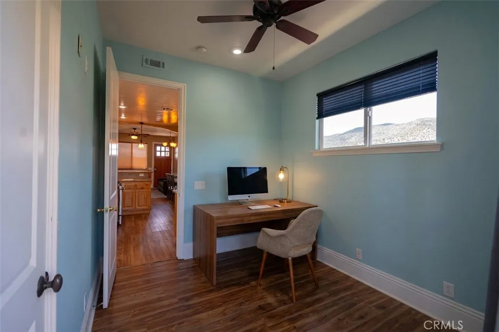 *AI FURNISHED* This photo has been virtually staged to show the potential of the space if utilized as a home office.