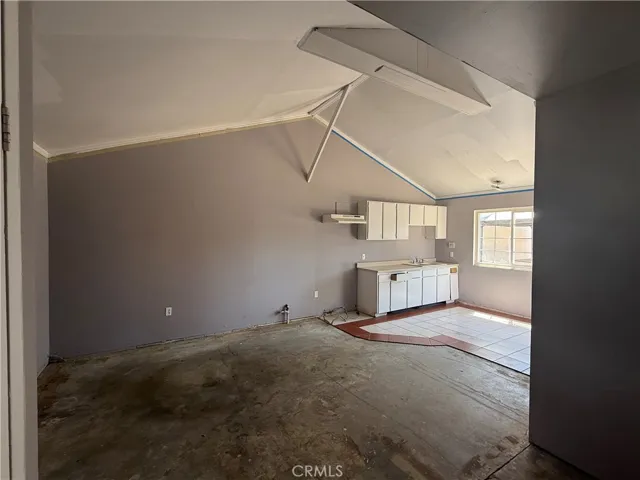 Living room of the backhouse. Higher ceiling from the garage.