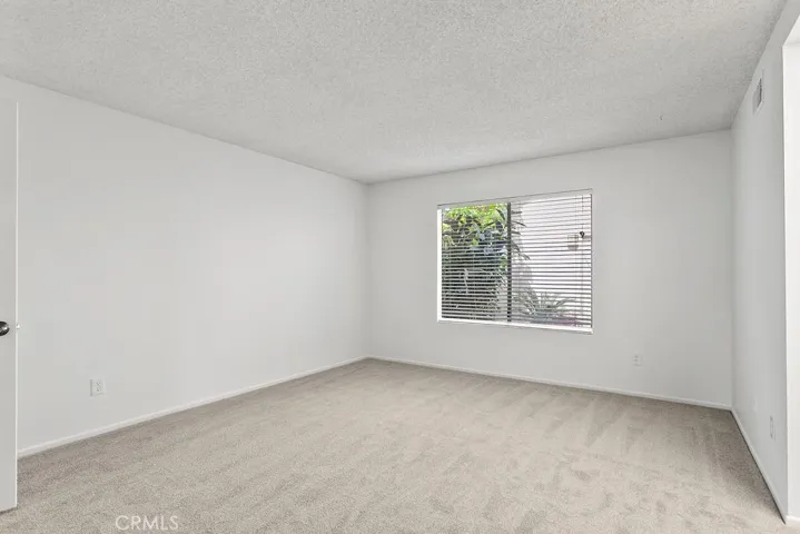 Primary bedroom with Atrium view