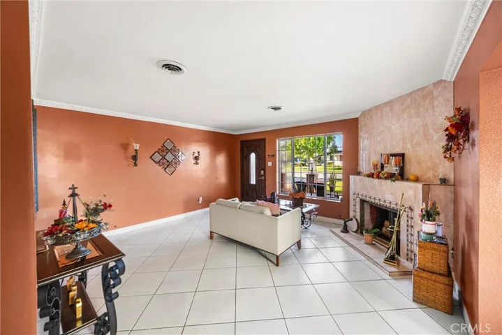 Fireplace in the living room with a beautiful mantel tile!