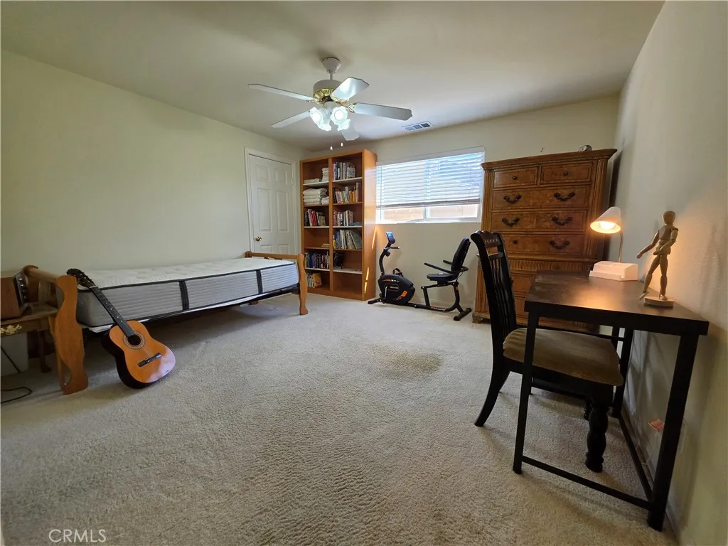 Main level 2nd primary bedroom with walk-in closet & private en-suite 3/4 bathroom with walk-in shower