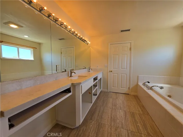 Primary Bathroom - 2 sinks (new painted cabinets going on this week), 2 sinks, quartz slab counters
