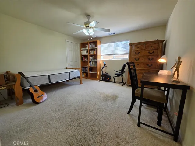 Main level 2nd primary bedroom with walk-in closet & private en-suite 3/4 bathroom with walk-in shower