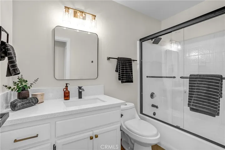 This additional bedroom is comfortable and move-in ready, with updated flooring, Quartz countertop, neutral paint, and a cozy feel.