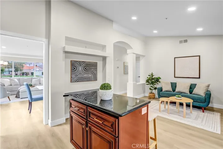 The open kitchen and family room create a comfortable space for cooking, visiting, and spending time together.