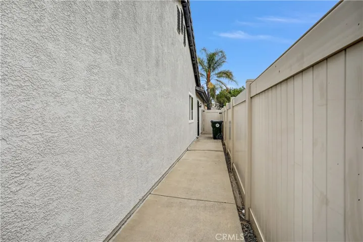 Side entrance to garage and back yard.