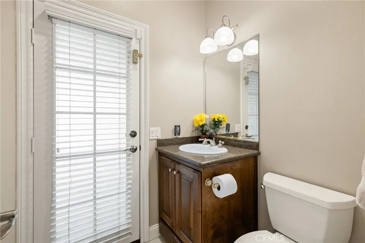 Powder bathroom with access to outside