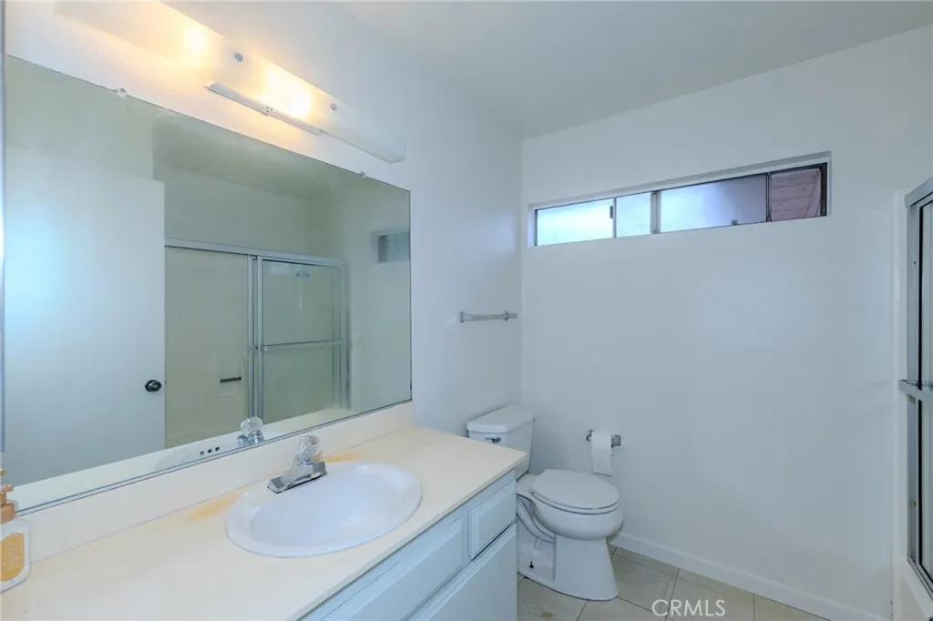 Convenient bathroom with tub and shower adjacent three upstairs bedrooms.