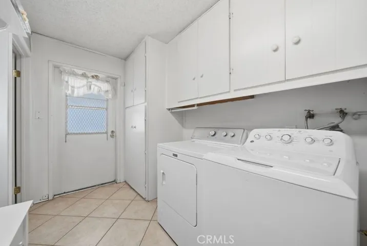 laundry room. Back yard entrance. Room off this area