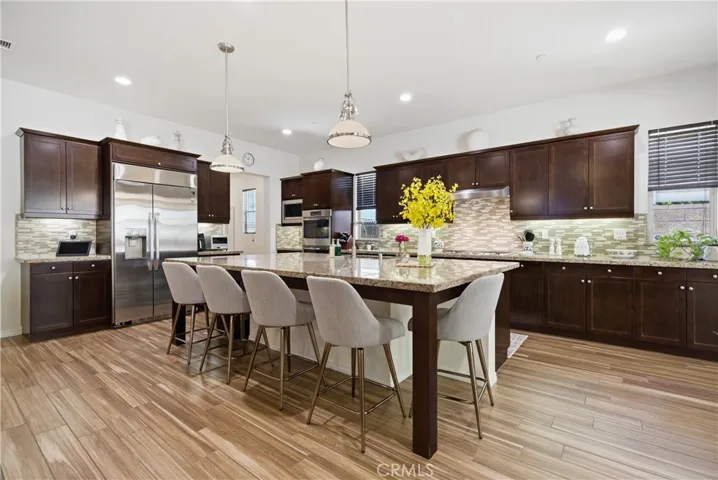 Fully equipped chef's kitchen with expansive center island.