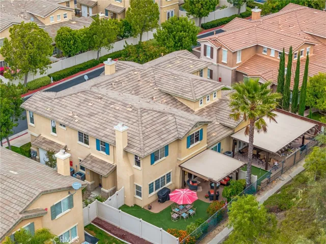 End unit with private backyard and 2 car attached garage