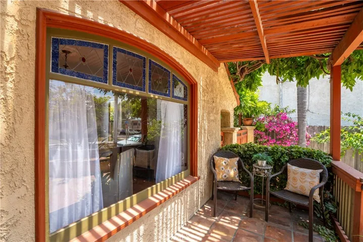 Wonderful place to sit and watch the world go by your lovely home.
