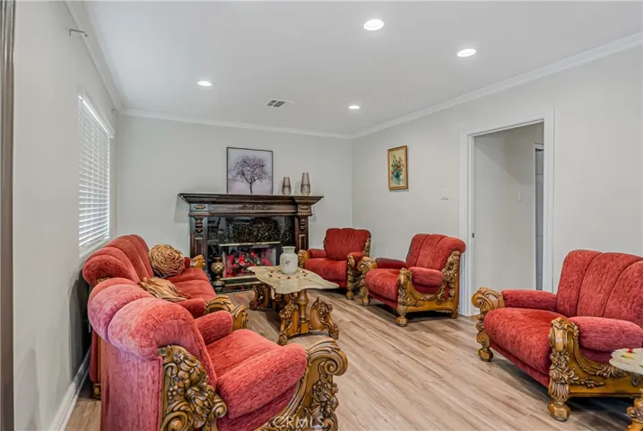LIVING ROOM WITH A DECORATIVE FIREPLACE