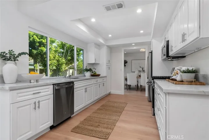 Brand new kitchen with large pantry and brand new refrigerator~new warranties included on all appliances!