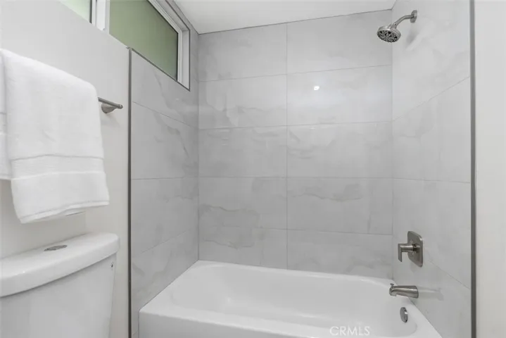 All new tub with shower overhead~