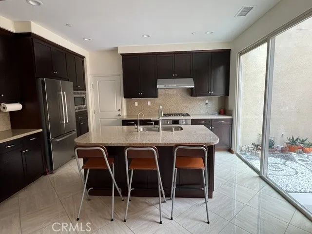 Kitchen with view of court year