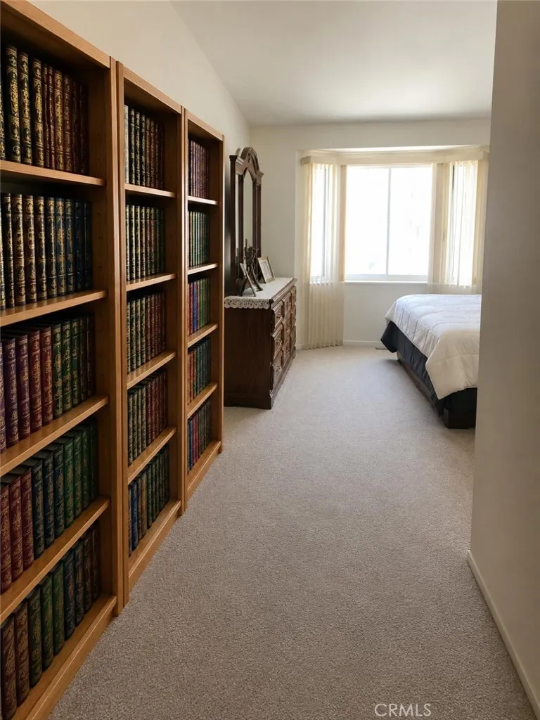 master bedroom upstairs,AI-Enhanced Photo: This image has been digitally enhanced using AI technology for marketing purposes. An original, unedited photo is provided for comparison. The enhancement does not represent any structural changes to the property.
