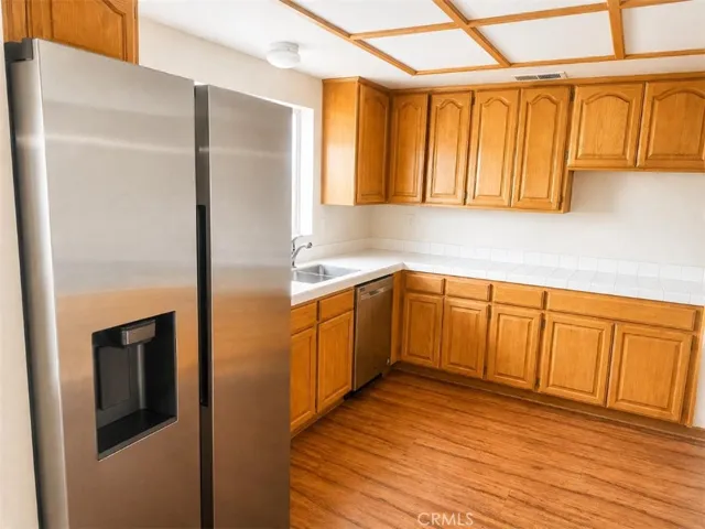 Kitchen,AI-Enhanced Photo: This image has been digitally enhanced using AI technology for marketing purposes. An original, unedited photo is provided for comparison. The enhancement does not represent any structural changes to the property.
