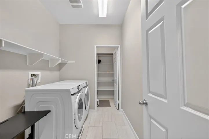 Upstairs Laundry Room with Storage Room