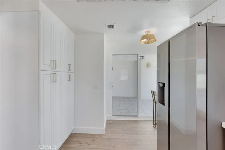 pantry and door to back covered patio area