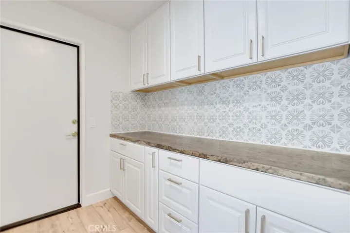 Tons for storage and cabinets as yoiu enter the home from the garage.