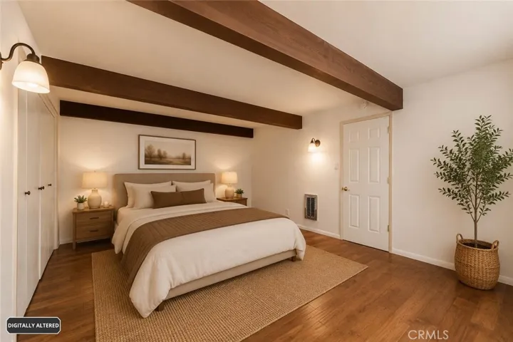 Downstairs master bedroom/Staged virtually