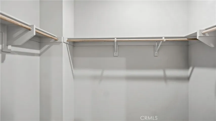 WALK IN CLOSET IN MASTER BEDROOM