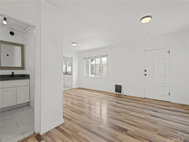 Back house living room and partial view of bathroom