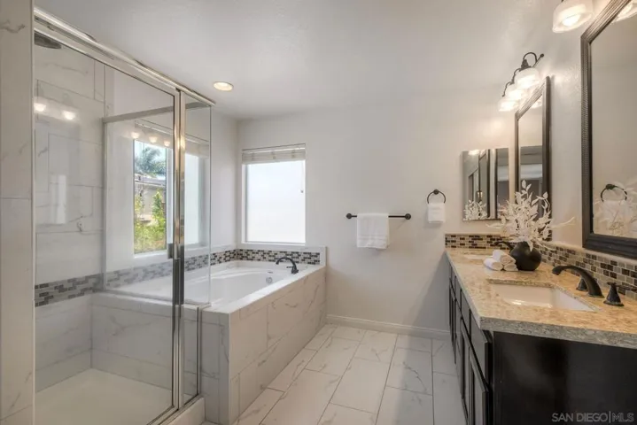 Primary bath with shower and soaking tub
