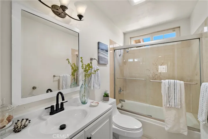 Completely Remolded Bathrooms with Quartz Countertops