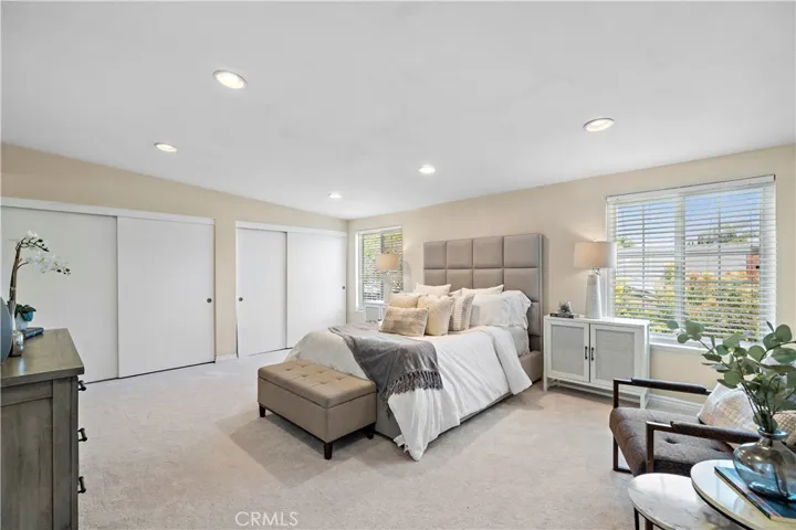 Good-Sized Master Bedroom that includes small sitting area and and Ensuite Bathroom