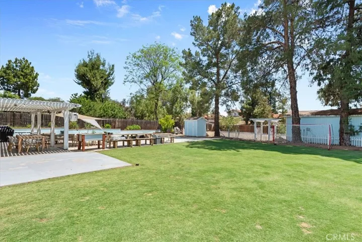 side view of back yard from grassy area