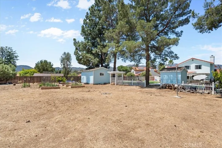 backyard garden area showing shed