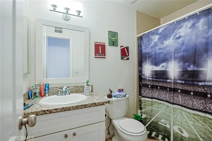Unit #1 upstairs hallway bath