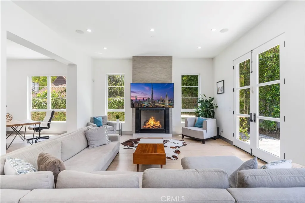 Walls of glass, comfy seating and a fireplace Walls of glass, comfy seating and a fireplace