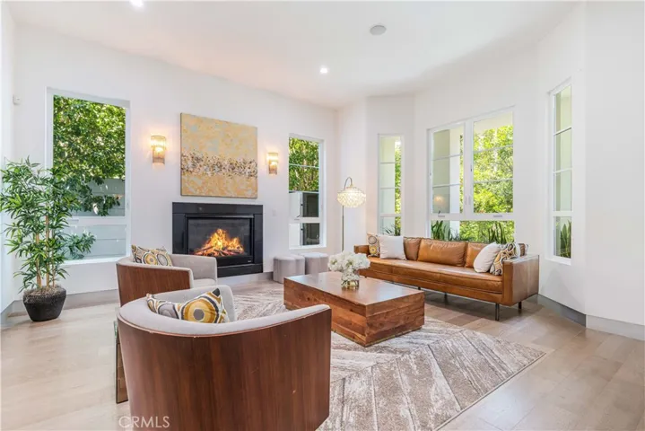 One of many fireplaces in home, living room