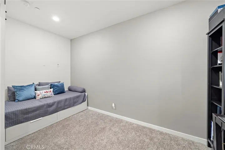 Main floor room, currently an office  Easy conversation for bedroom,