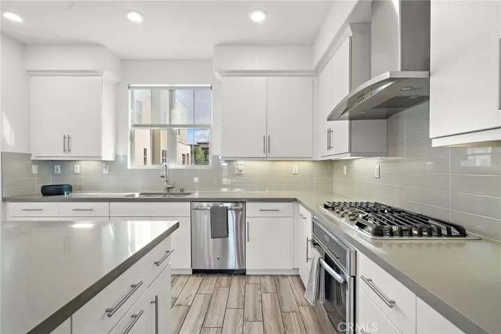 Quartz Counter tops.  Stainless Steel appliances. 
