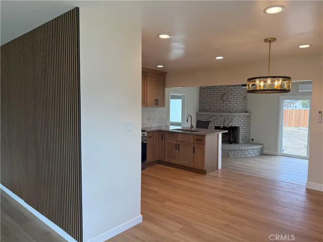 Open Layout to kitchen and dining area.