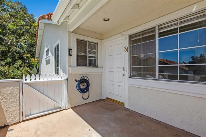 Front Patio with Picket Gate