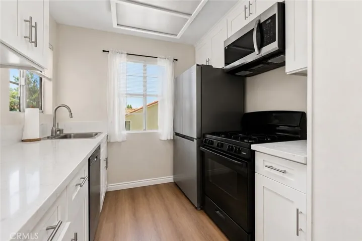 Quartz Counter Tops and Plenty of Kitchen Storage

