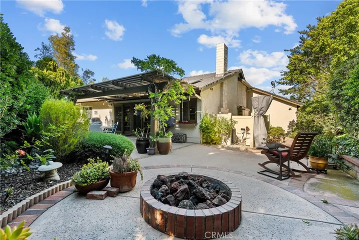 Backyard firepit sitting area.