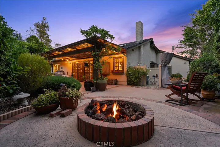 Backyard firepit sitting area.