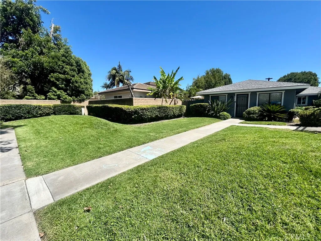 Private Entry with large greenbelt in your front yard.